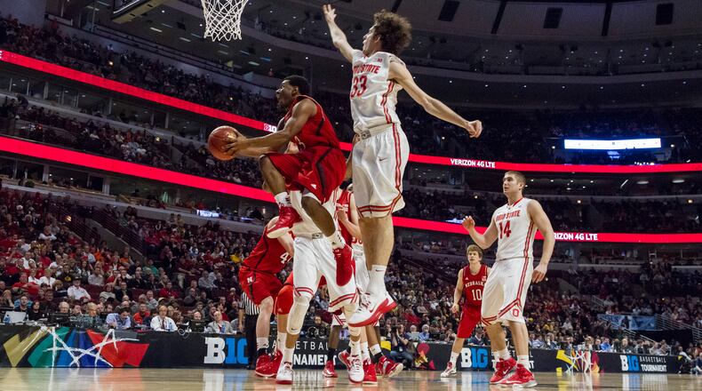 Nebraska Cornhuskers guard Benny Parker shoots over Amedeo Della Valle of the Ohio State Buckeyes during a Big Ten tournament game at the United Center, Chicago, Illinois. (AP Photo/Damen Jackson via Triple Play New Media)