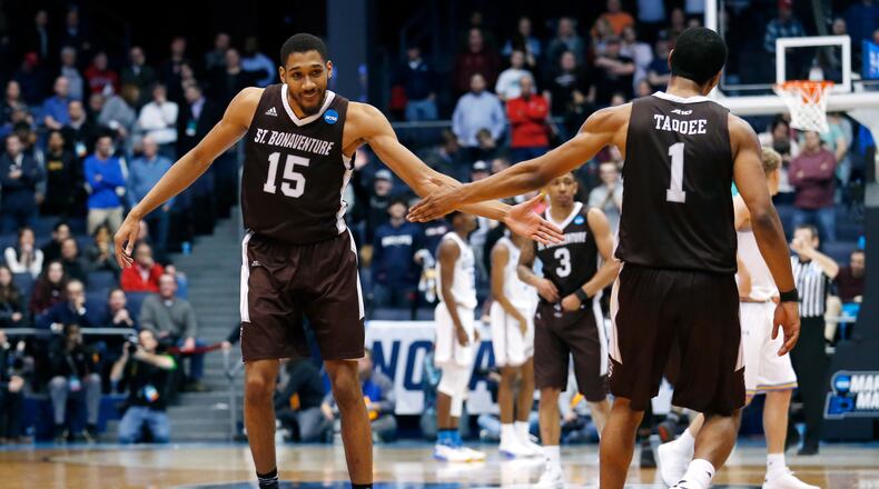 DAYTON, OH - MARCH 13: LaDarien Griffin #15 and Idris Taqqee #1 of the St. Bonaventure Bonnies celebrate their team’s late game lead over the UCLA Bruins during the second half of the First Four game in the 2018 NCAA Men’s Basketball Tournament at UD Arena on March 13, 2018 in Dayton, Ohio. The St. Bonaventure Bonnies defeated the UCLA Bruins 65-58. (Photo by Kirk Irwin/Getty Images)