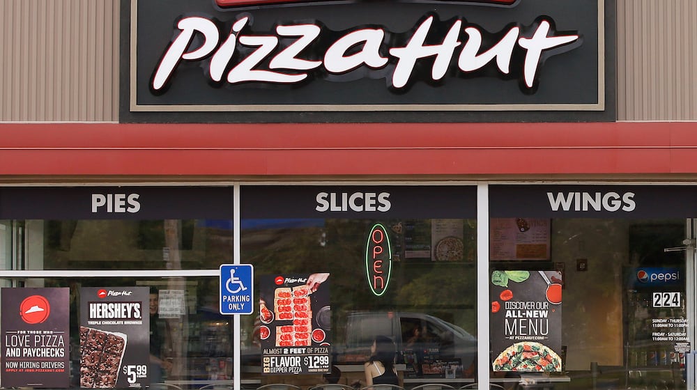 FILE - Pizza Hut is seen in in Taunton, Mass., on July 9, 2015. (AP Photo/Stephan Savoia, File)