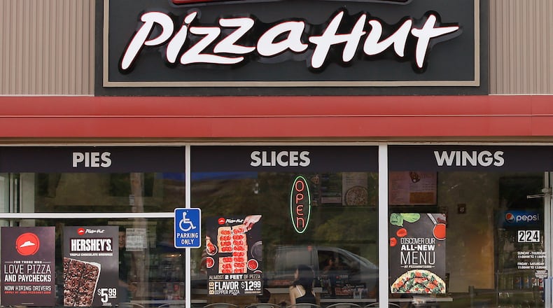 FILE - Pizza Hut is seen in in Taunton, Mass., on July 9, 2015. (AP Photo/Stephan Savoia, File)