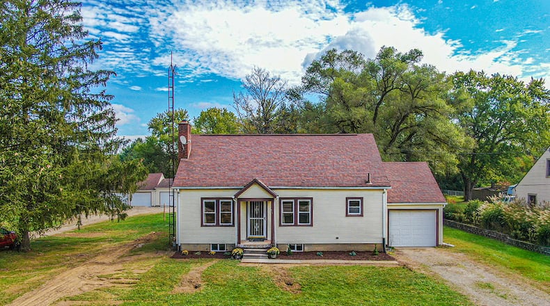 The front of the 2-bedroom home has been freshly landscaped and includes the attached, 1-car garage. The home offers about 1,930 sq. ft. of living space with many updates throughout, and the 1.85-acre lot includes a detached, 4-car garage. CONTRIBUTED PHOTO
