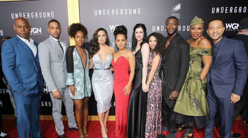 WESTWOOD, CA - MARCH 01: (L-R) Actors Bokeem Woodbine, Alano Miller, DeWanda Wise, Jurnee Smollett-Bell, Amirah Vann, Jessica de Gouw, Jasika Nicole, Aldis Hodge, Aisha Hinds, and actor/singer/executive producer John Legend attend WGN America’s “Underground” Season Two Premiere Screening at Regency Village Theatre on March 1, 2017 in Westwood, California. (Photo by Rachel Murray/Getty Images for WGN America)