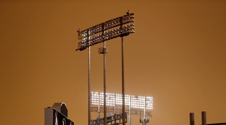 RingCentral Coliseum stands under skies darkened by wildfire smoke before the Oakland Athletics' baseball game against the Houston Astros in Oakland, Calif., Wednesday, Sept. 9, 2020. (AP Photo/Jed Jacobsohn)