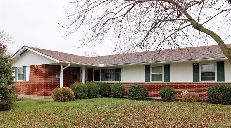 A Huber Heights home is on the market for $204,986. The brick home at 7811 Harshmanville Road offers about 1,625 square feet of living space. Contributed by Kathy Tyler