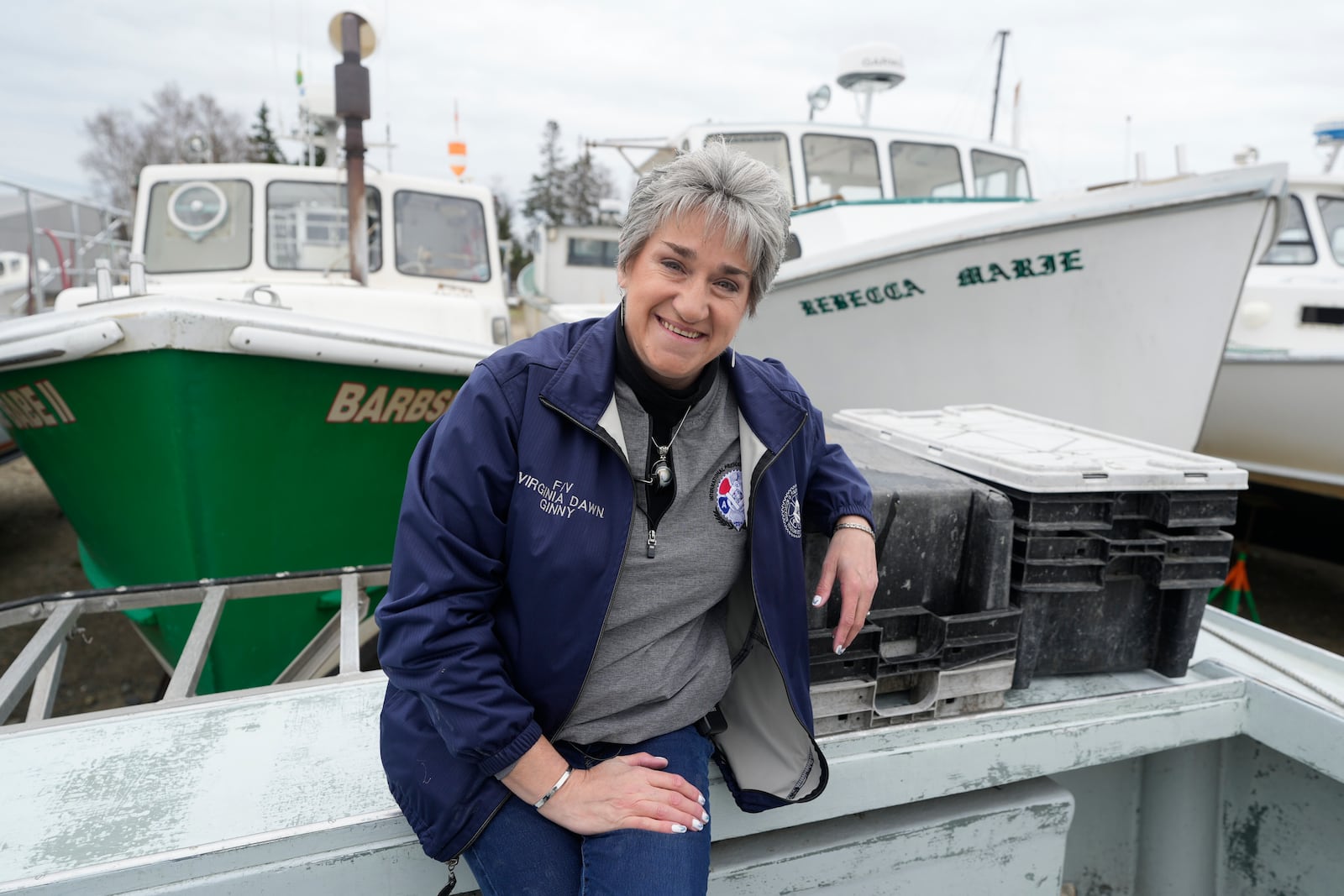 Commercial lobster fisherman Virginia Olsen sits for a portrait in Stonington, Maine, on Friday, May 2, 2025. (AP Photo/Robert F. Bukaty)