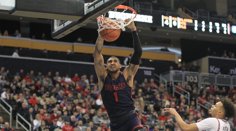 Dayton’s Obi Toppin dunks against Duquesne on Wednesday, Jan. 29, 2020, at PPG Paints Arena in Pittsburgh.