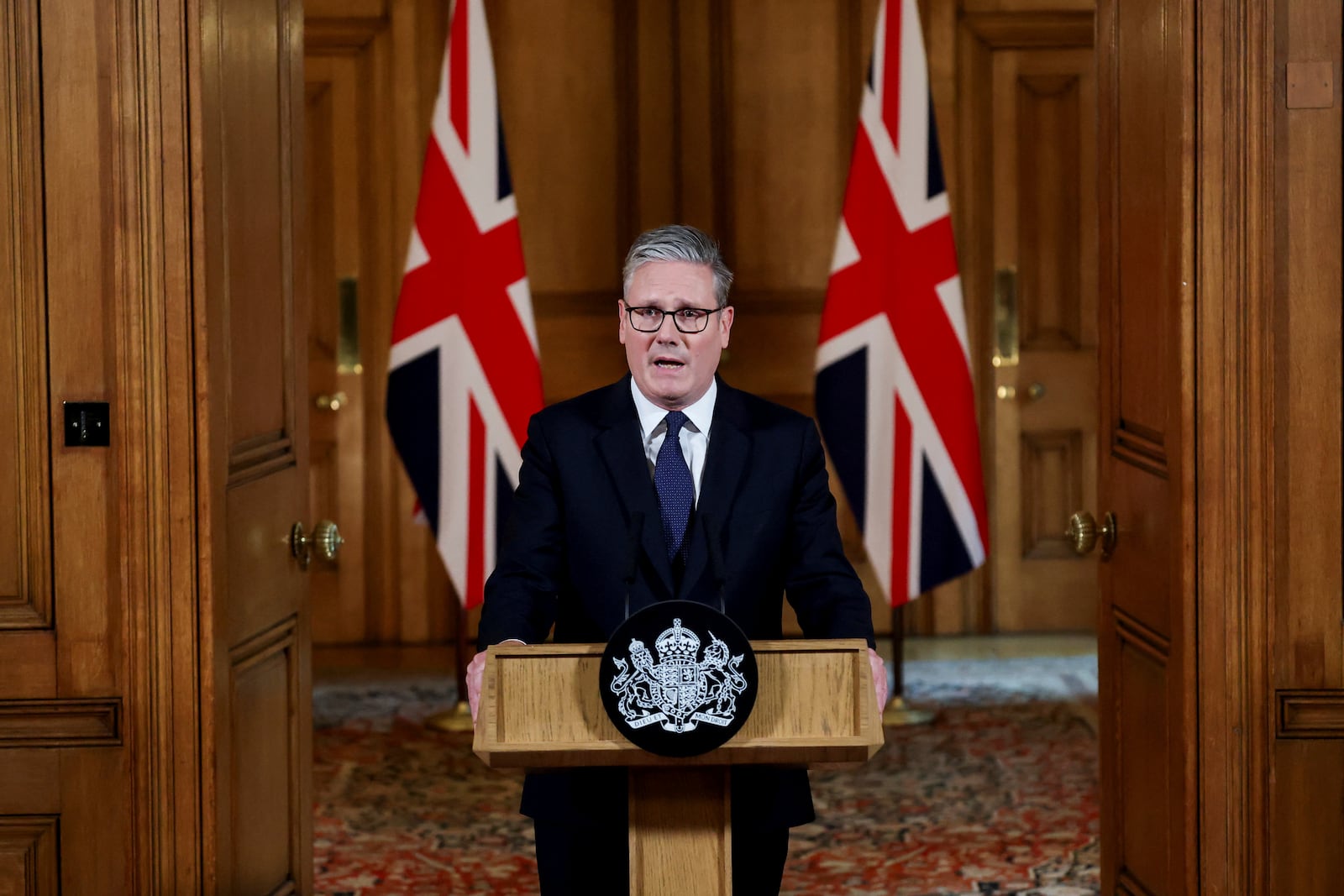 Britain's Prime Minister Keir Starmer delivers a statement inside No. 10 Downing Street on the day the cabinet was recalled to discuss the situation in Gaza, in London, Tuesday, July 29, 2025. (Toby Melville, Pool Photo via AP)