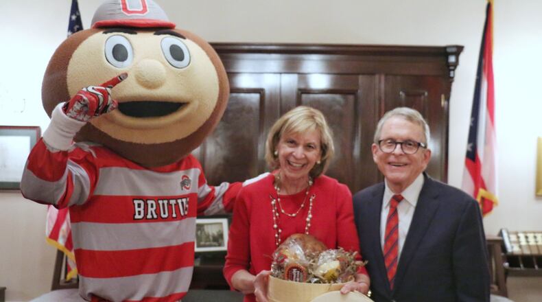Ohio Gov. Mike DeWine collected on a friendly bet with Michigan Gov. Gretchen Whitmer on the outcome of the Ohio State-Michigan game. The payola? A basket of goodies from a famous Ann Arbor deli. He is considering a bet with South Carolina Gov. Henry McMaster on the Clemson-OSU game.