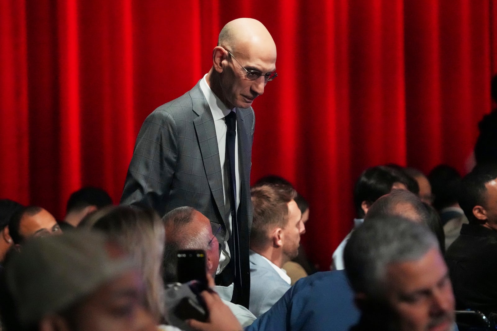 NBA commissioner Adam Silver walks through the audience in the NBA basketball draft lottery in Chicago, Monday, May 12, 2025. (AP Photo/Nam Y. Huh)