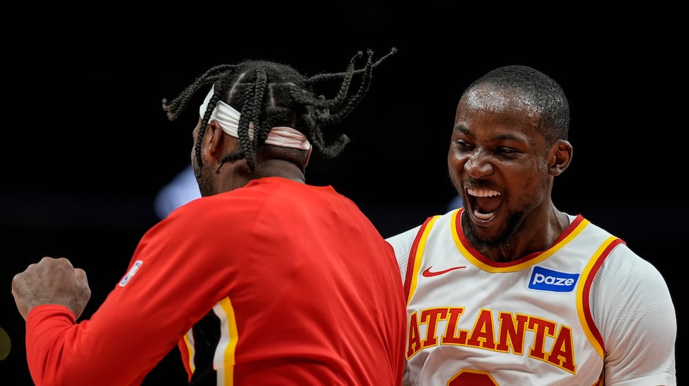 Atlanta Hawks forward Jonathan Kuminga (0) celebrates his basket against the Portland Trail Blazers during the second half of an NBA basketball game, Sunday, March 1, 2026, in Atlanta. (AP Photo/Mike Stewart)