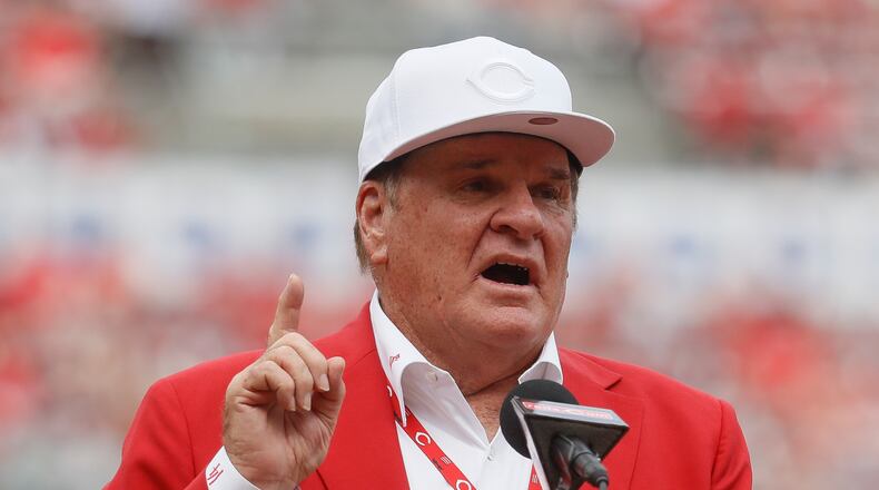 FILE - Pete Rose speaks during a statue-dedication ceremony before a baseball game between the Cincinnati Reds and the Los Angeles Dodgers, June 17, 2017, in Cincinnati. (AP Photo/John Minchillo, File)