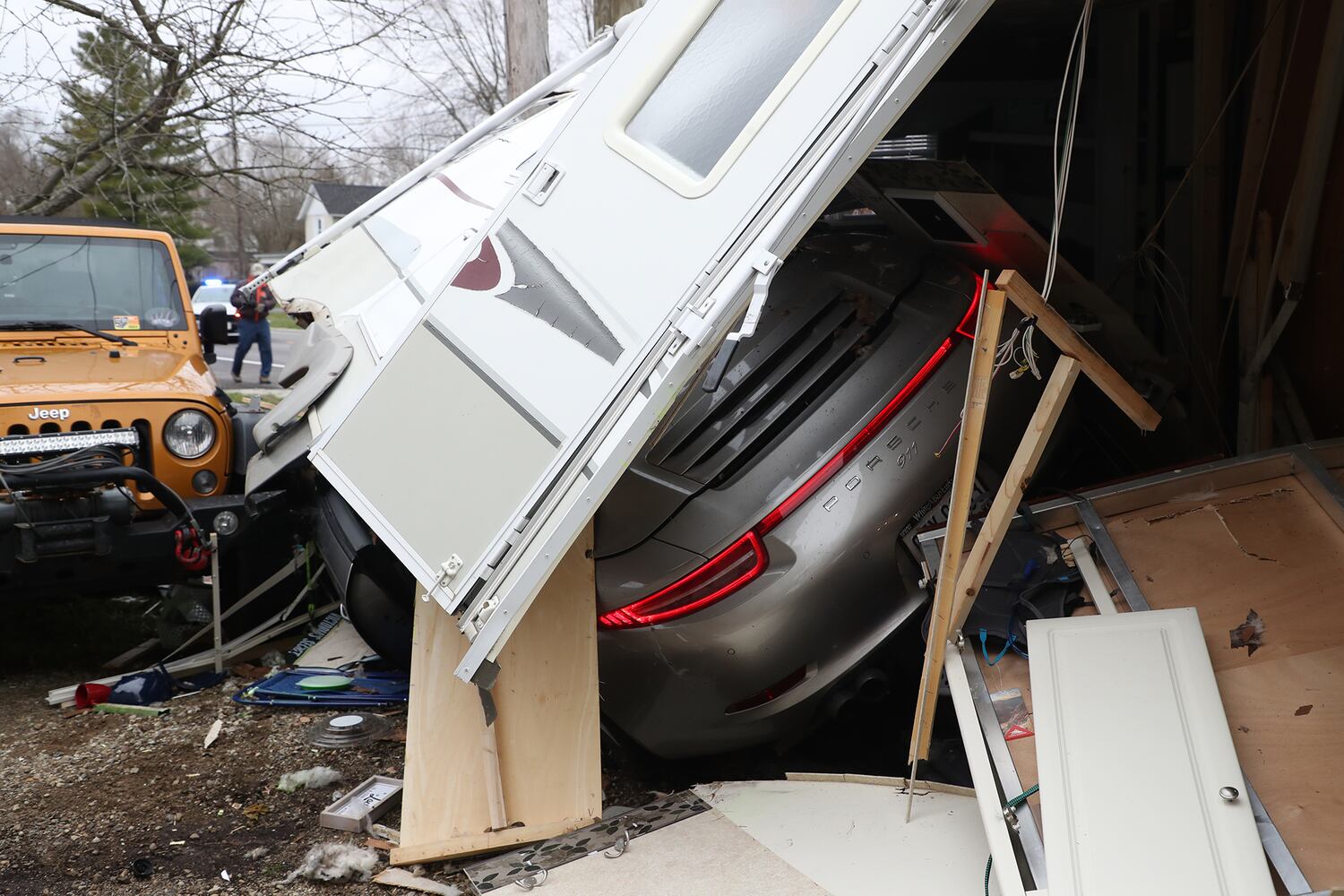 PHOTOS: Porsche Crashes Through Camper
