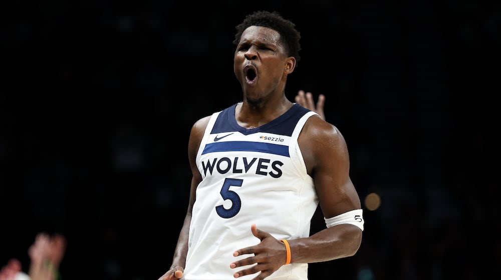 Minnesota Timberwolves guard Anthony Edwards (5) celebrates his three-point basket during the second half of an NBA basketball game against the Cleveland Cavaliers, Thursday, Jan. 8, 2026, in Minneapolis. (AP Photo/Matt Krohn)