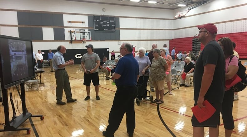 Greenon School Board President Dennis Henry speaks during a community forum about new schools earlier this year. The district will host a ground breaking ceremony for those schools Wednesday.