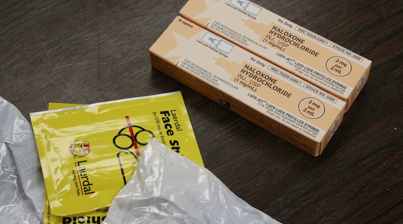 The contents of a Narcan Kit which first responders are given to use on overdose patients. BILL LACKEY/STAFF FILE