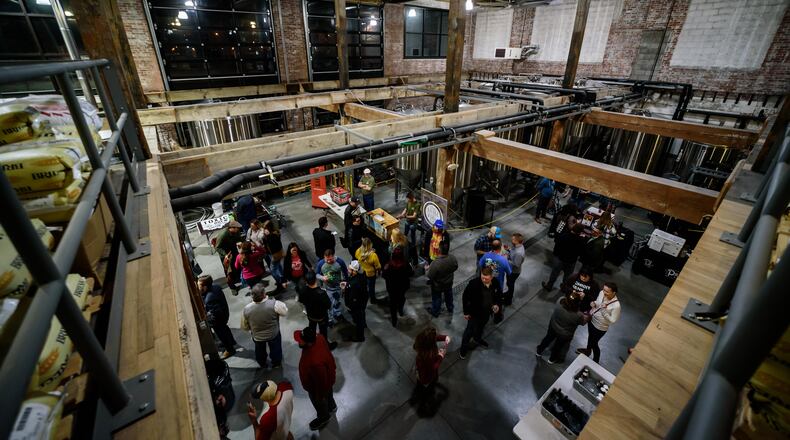 Mother Stewart's Brewing Co. in Springfield hosted a "Cold & Bold" festival celebrating barrel-aged beers over the weekend on Saturday, Jan. 11. The event featured beer from local breweries as well as local music. TOM GILLIAM / CONTRIBUTING PHOTOGRAPHER
