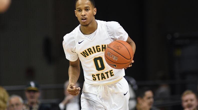 Wright State freshman Jaylon Hall brings the ball up the court against Wisconsin-Milwaukee on Saturday at the Nutter Center. KEITH COLE/CONTRIBUTED PHOTO