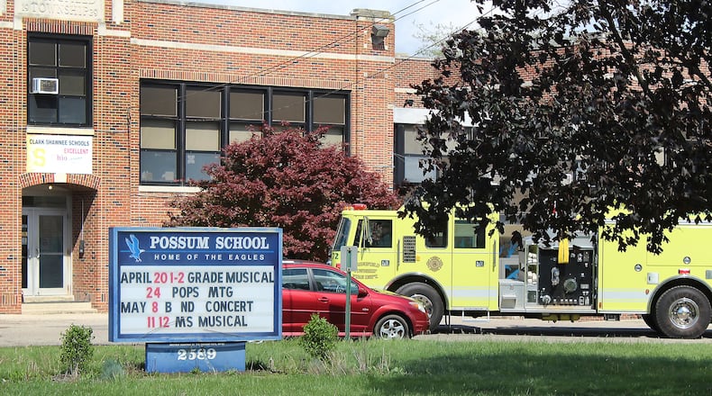 Springfield Twp. Fire Department investigate a natural gas leak at Possum School Tuesday morning. JEFF GUERINI/STAFF