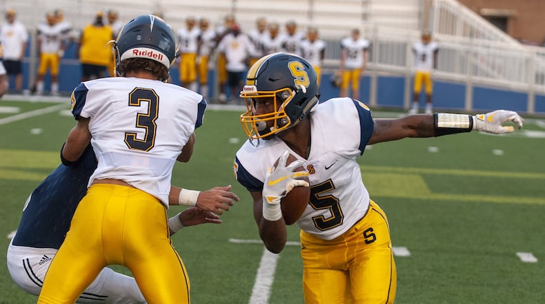 Springfield’s Larry Stephens returns the opening kickoff Friday night at Fairmont. Stephens caught a touchdown pass in the first half. Jeff Gilbert/CONTRIBUTED