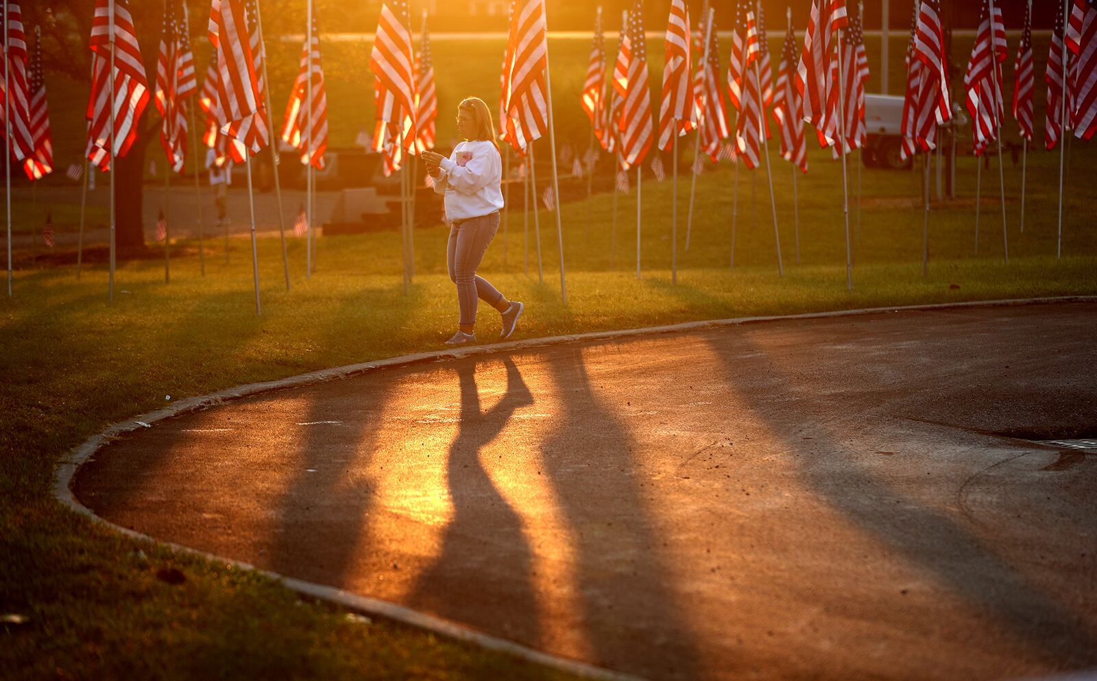 Champaign County held a 9/11 Remembrance Ceremony Saturday, the 20th anniversary of the terrorist attacks on America. The ceremony at Freedom Grove in Urbana, where a piece of the World Trade Center is located, remembered all the victims including Alicia Titus, a Champaign County native who was a flight attendant on the second plane to strike the World Trade Center. To mark the 20th anniversary, a 5k peace run/walk was held in Alicia's name. BILL LACKEY/STAFF