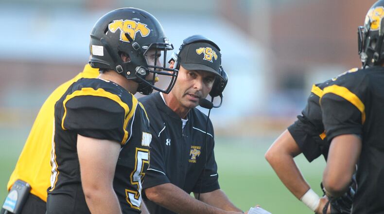 Shawnee coach Rick Meeks talks to his players during a game against Clinton-Massie on Friday, Sept. 9, 2016, in Springfield. DAVID JABLONSKI / STAFF