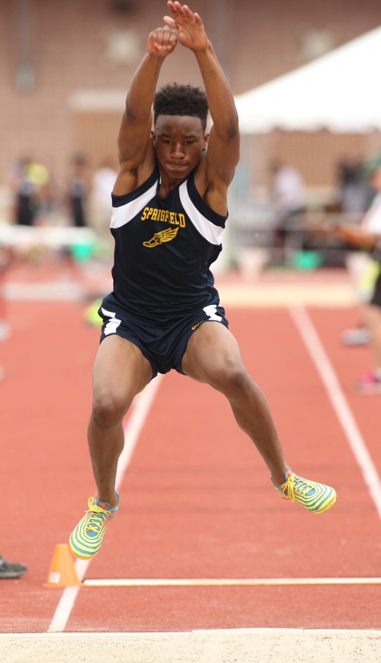 Springfield’s Quincy Scott competes in the long jump at the Division I state track and field meet on Saturday, June 4, 2016, at Jesse Owens Memorial Stadium in Columbus. David Jablonski/Staff