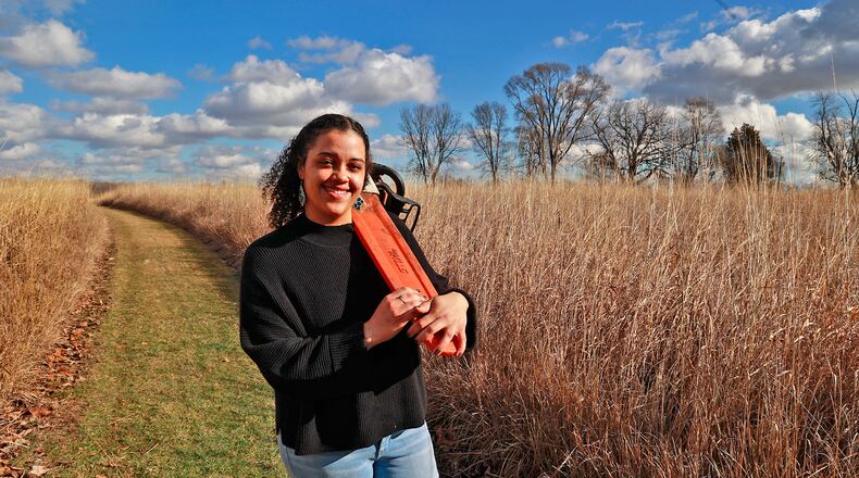 Olivia Lawrence, a senior at Wittenberg University, was part of the first all-women Alaska Conservation Corp. Fire Crew in the 49th state last summer. Olivia's interest was sparked by a prescribed burn at the Kirby Nature Preserve at Old Reid Park. BILL LACKEY/STAFF