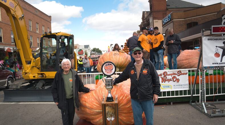 2023's Circleville Pumpkin Show Pumpkin Weigh-in winners Dr. Robert and Jo Liggett with a 2,388 pound pumpkin.