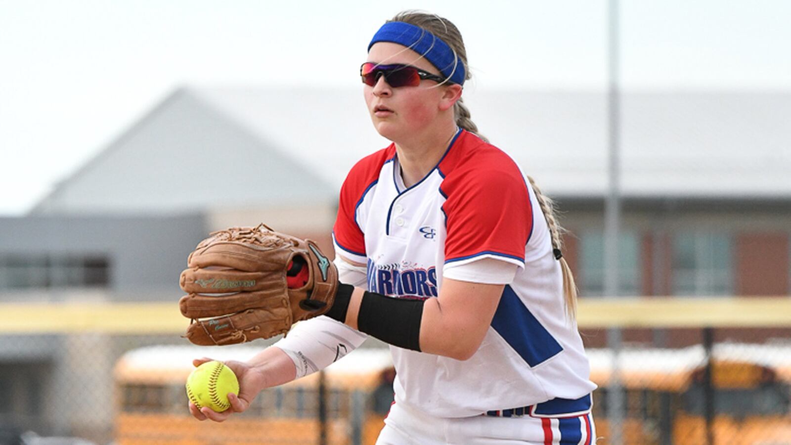 Northwestern junior pitcher Jenna Robbins winds up during a game against Graham on April 17. Robbins broke the school’s all-time strikeout record during the first inning of a game against Bellefontaine on Wednesday. BRYANT BILLING / CONTRIBUTED