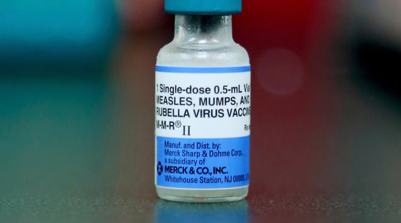 FILE - A vial of a measles, mumps and rubella vaccine is seen in Mount Vernon, Ohio, Friday, May 17, 2019. The World Health Organization and the U.S. Centers for Disease Control and Prevention said Thursday, Nov. 16, 2023 that measles deaths globally spiked by more than 40% last year. The number of cases also rose by nearly 20% after immunization levels dropped to their lowest in 15 years during the COVID pandemic. (AP Photo/Paul Vernon, File)
