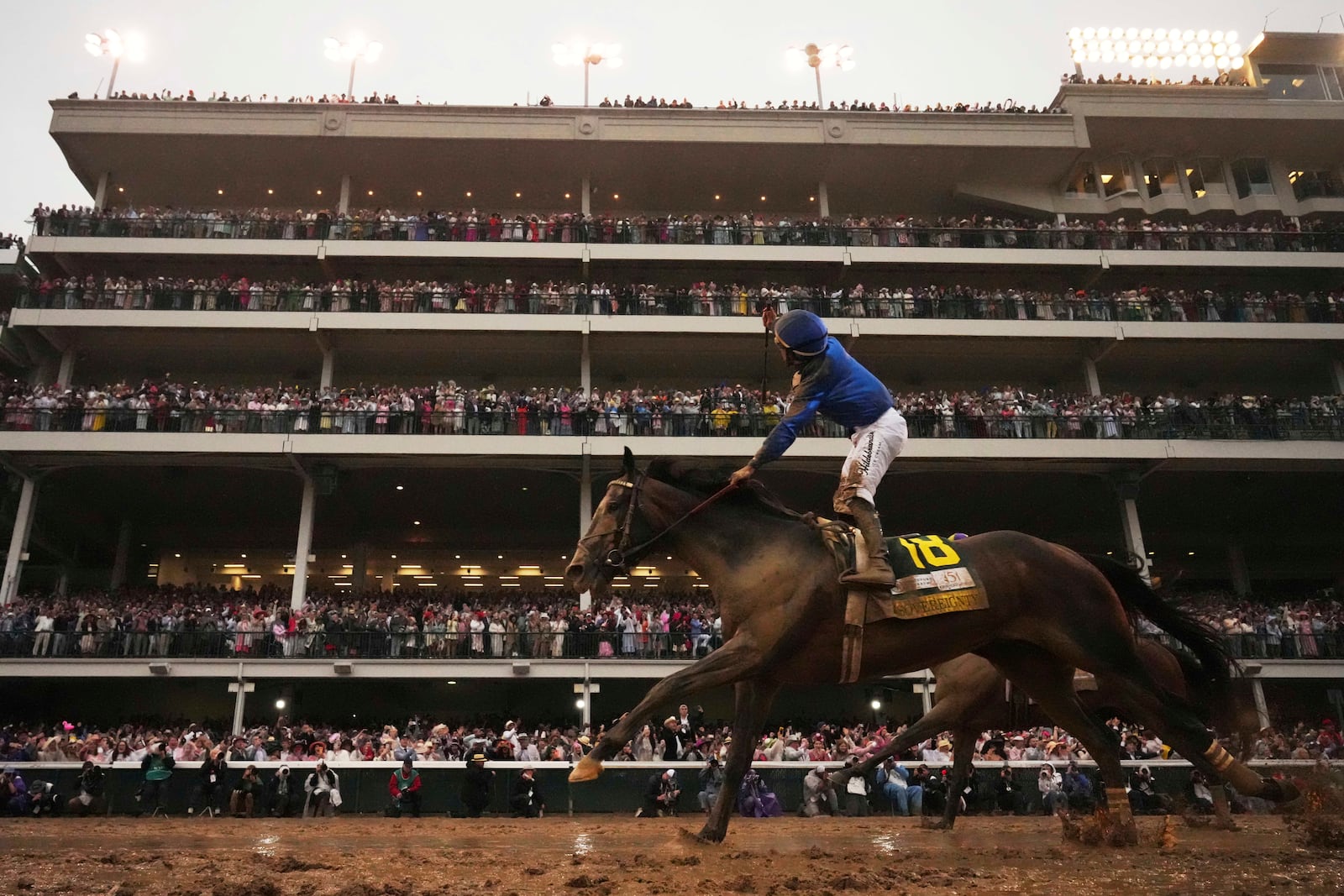 Sovereignty, ridden by Junior Alvarado, crosses the finish line to win the 151st running of the Kentucky Derby horse race at Churchill Downs Saturday, May 3, 2025, in Louisville, Ky. (AP Photo/Abbie Parr)