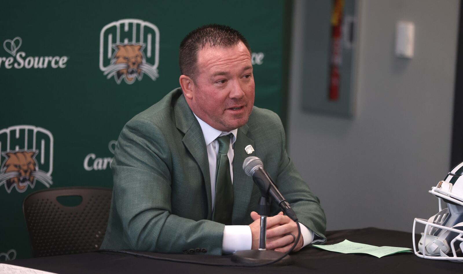 Wittenberg graduate John Hauser speaks at a press conference after being introduced as Ohio's new head football coach on Friday, Jan. 9, 2026, in Athens. David Jablonski/Staff