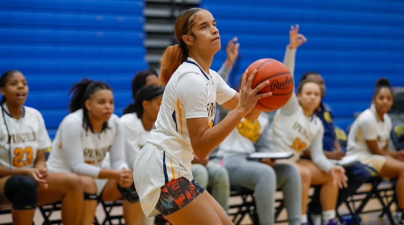Cutline: Springfield High School sophomore Milly Portis shoots a 3-pointer during their game against Wayne earlier this season. Michael Cooper/CONTRIBUTED