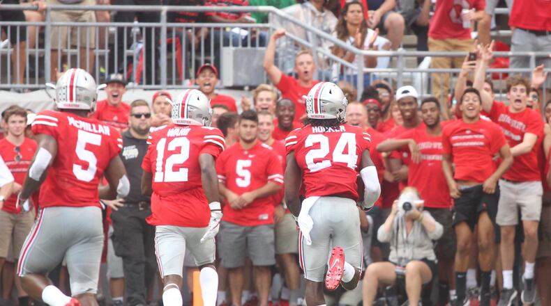 Ohio State's Malik Hooker returns an interception for a touchdown against Tulsa on Saturday, Sept. 10, 2016, at Ohio Stadium in Columbus. David Jablonski/Staff