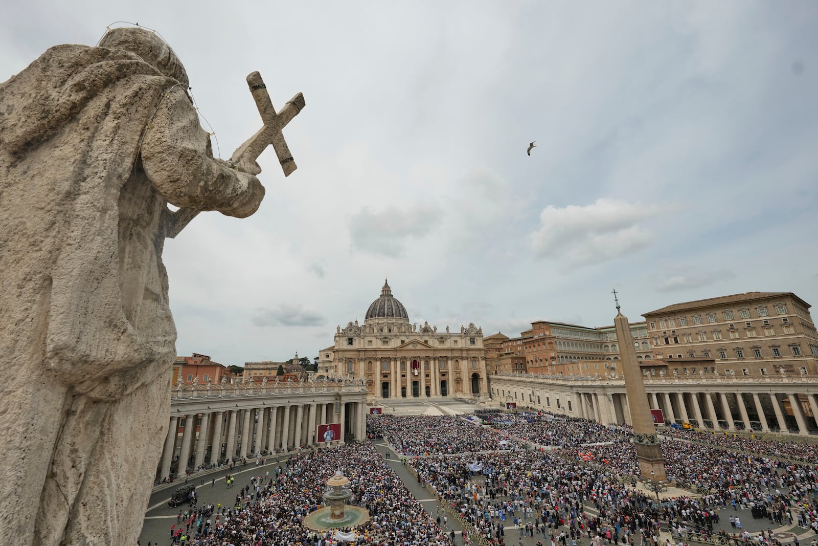 Pope Leo XIV appears at the central balcony of St. Peter's Basilica for his first Sunday blessing after his election, in St. Peter¥s Square at the Vatican, Sunday May 11, 2025. (AP Photo/Alessandra Tarantino)