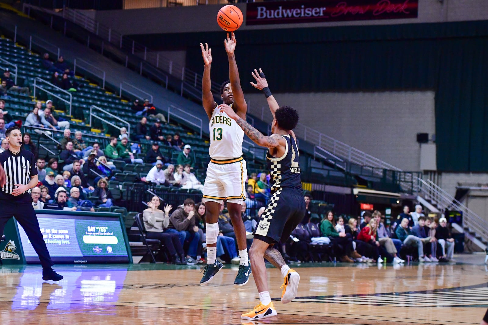 Wright State University's Solomon Callaghan shoots a 3-pointer during their game against Oakland on Monday, Dec. 29 at Wright State's Nutter Center. JOSEPH R. CRAVEN / CONTRIBUTED PHOTO