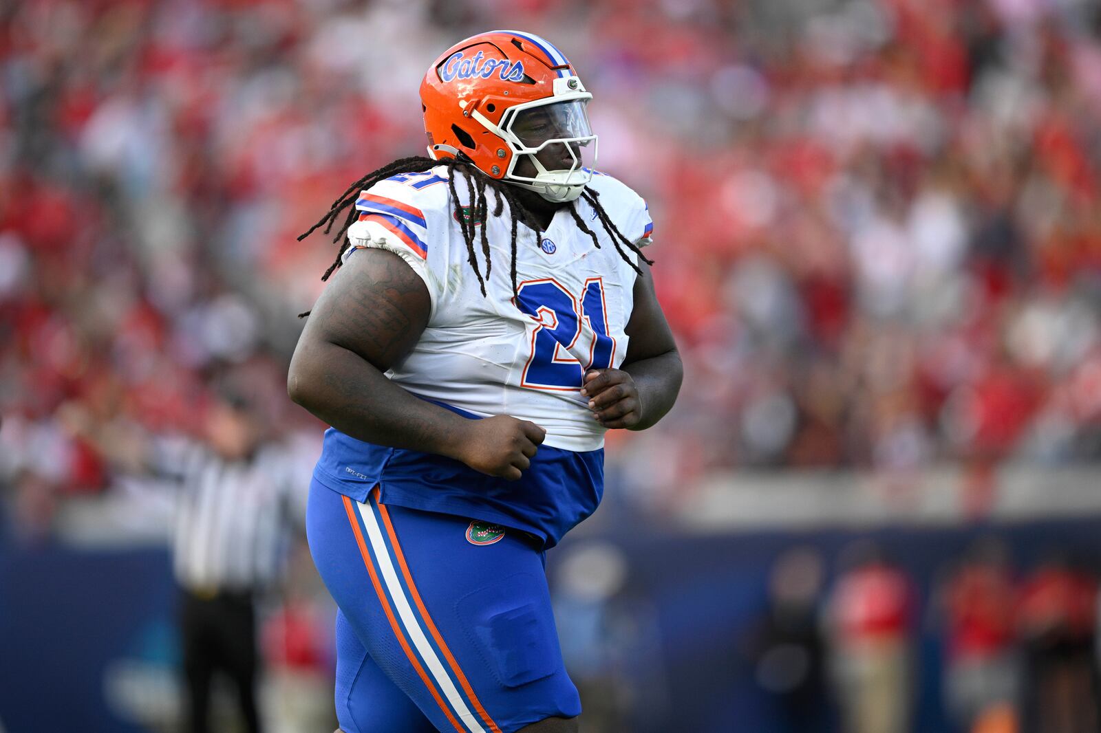 FILE - Florida defensive lineman Desmond Watson (21) runs off the field against Georgia during the first half of an NCAA college football game, Nov. 2, 2024, in Jacksonville, Fla. (AP Photo/Phelan M. Ebenhack, File)