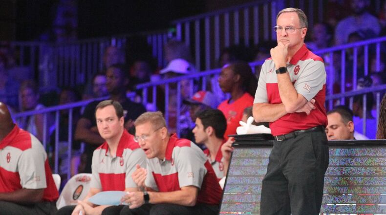 Oklahoma's Lon Kruger watches a game against Wisconsin on Thursday, Nov. 22, 2018, at the Battle 4 Atlantis on Paradise Island, Bahamas.