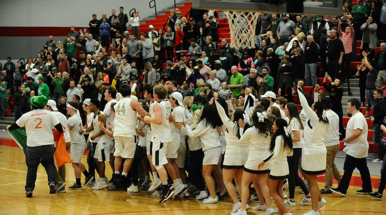 Central Catholic celebrates after its 42-40 overtime win over Legacy Christian in Saturday’s Division IV sectional final. Greg Billing/CONTRIBUTED