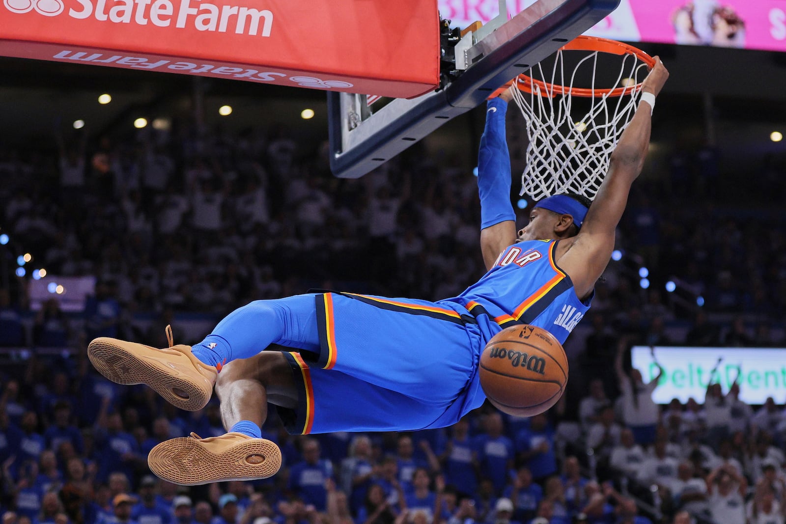 Oklahoma City Thunder guard Shai Gilgeous-Alexander (2) dunks during the second half of Game 5 of the Western Conference finals of the NBA basketball playoffs against the Minnesota Timberwolves, Wednesday, May 28, 2025, in Oklahoma City. (AP Photo/Nate Billings)