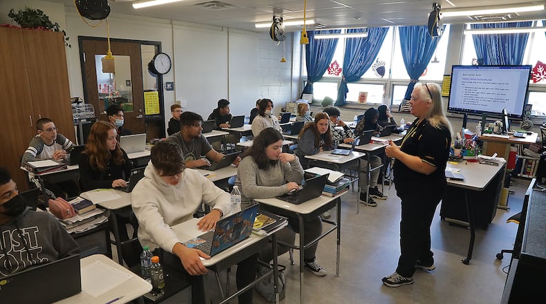 Brenda Vinson teaches a financial literacy class a Shawnee High School. BILL LACKEY/STAFF
