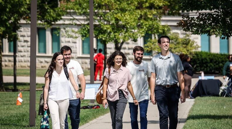 Wright State University students walk to class Wednesday September 14, 2022. Wright State University and Central State are collaborating on a semiconductor lab. JIM NOELKER/STAFF