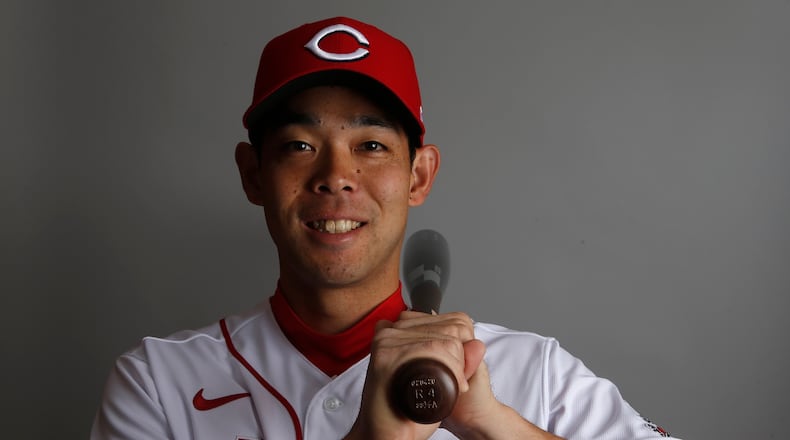 Cincinnati Reds center fielder Shogo Akiyama, of Japan, poses for a photograph during spring training baseball photo day Wednesday, Feb. 19, 2020 in Goodyear, Ariz. (AP Photo/Ross D. Franklin)