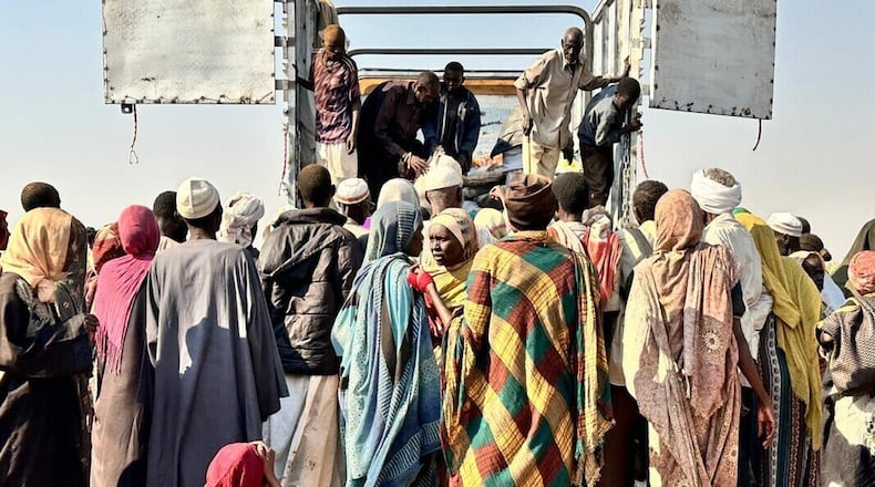 This photo released by The Norwegian Refugee Council (NRC) shows displaced families from el-Fasher at a displacement camp where they sought refuge from fighting between government forces and the RSF, in Tawila, Darfur region, Sudan, Friday, October. 31, 2025. (NRC via AP)