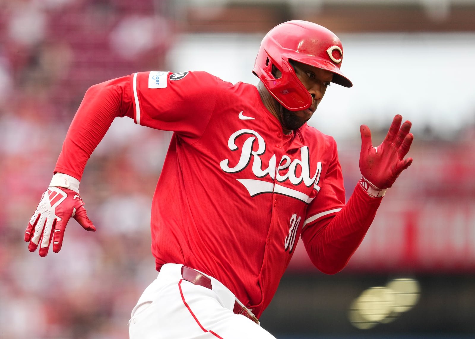 Cincinnati Reds outfielder Will Benson rounds third base and scores on a single hit by Spencer Steer during the fourth inning of a baseball game against the Arizona Diamondbacks, Saturday, June 7, 2025, in Cincinnati. (AP Photo/Jeff Dean)