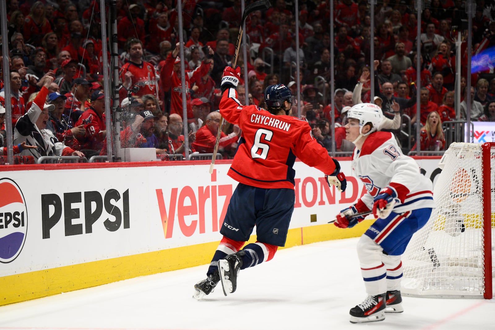 Washington Capitals defenseman Jakob Chychrun (6) celebrates his goal past Montreal Canadiens right wing Cole Caufield (13) in the first period of Game 5 of a first-round NHL hockey playoff series Wednesday, April 30, 2025, in Washington. (AP Photo/Nick Wass)
