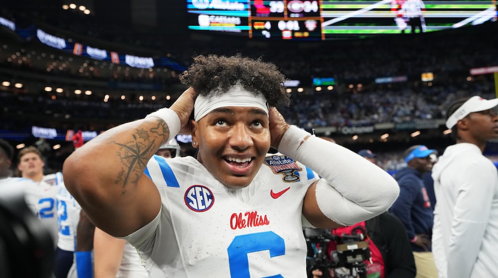 Mississippi quarterback Trinidad Chambliss (6) celebrates after the Sugar Bowl NCAA college football playoff quarterfinal game against Georgia in New Orleans, Thursday, Jan. 1, 2026. (AP Photo/Mathew Hinton)