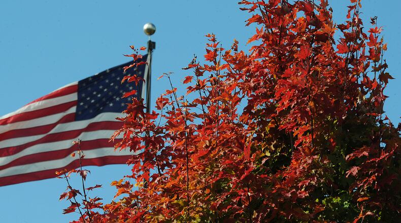 The red, white and blue with fall colors at Carillon Park. MARSHALL\STAFF