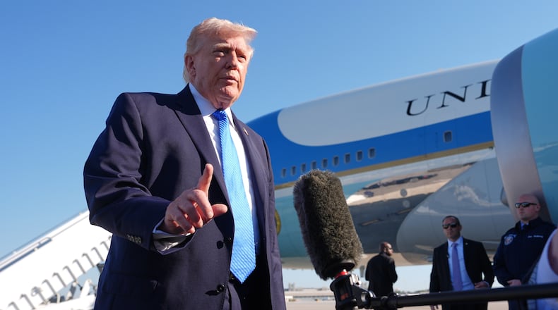 President Donald Trump speaks with the media before boarding Air Force One, Monday, March 23, 2026, at Palm Beach International Airport in West Palm Beach, Fla. (AP Photo/Mark Schiefelbein)