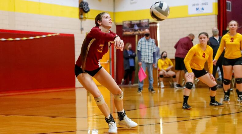Cutline2: Northeastern senior Elizabeth Wiseman digs the ball during a match against Mechanicsburg last season. The Jets are seeking their third straight OHC North Division title. CONTRIBUTED PHOTO BY MICHAEL COOPER